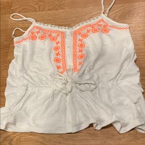 White tank with orange design